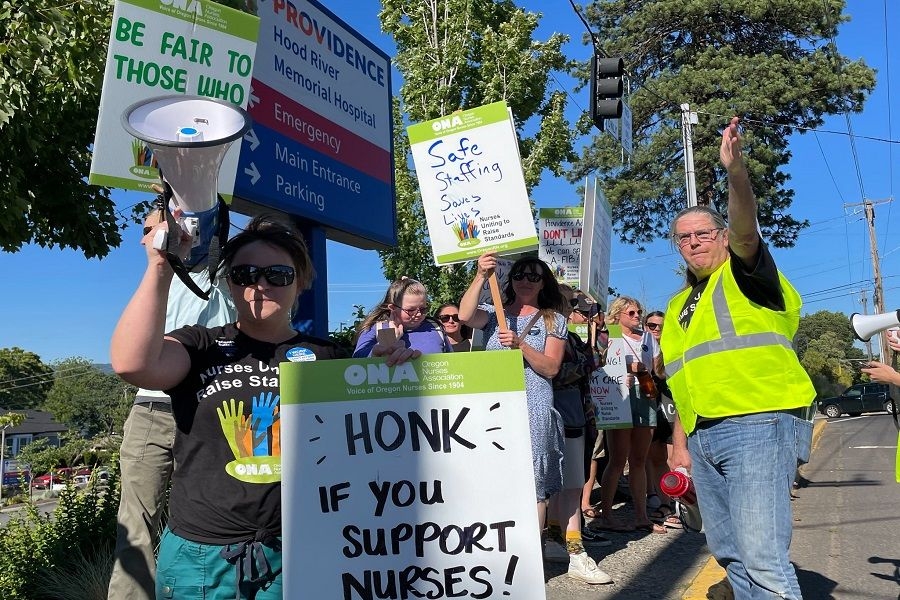 Kevin Mealy, ONA 200 ONA nurses, community allies and elected leaders lead a march and informational picket past Providence Hood River during Hood River's First Friday event on July 1, 2022.